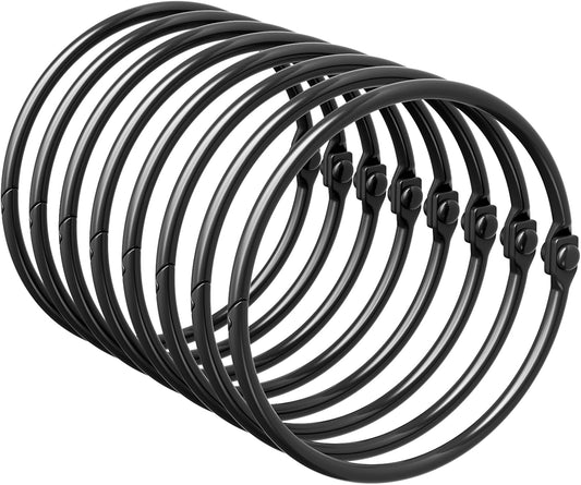 Set of black metal coils on a white background