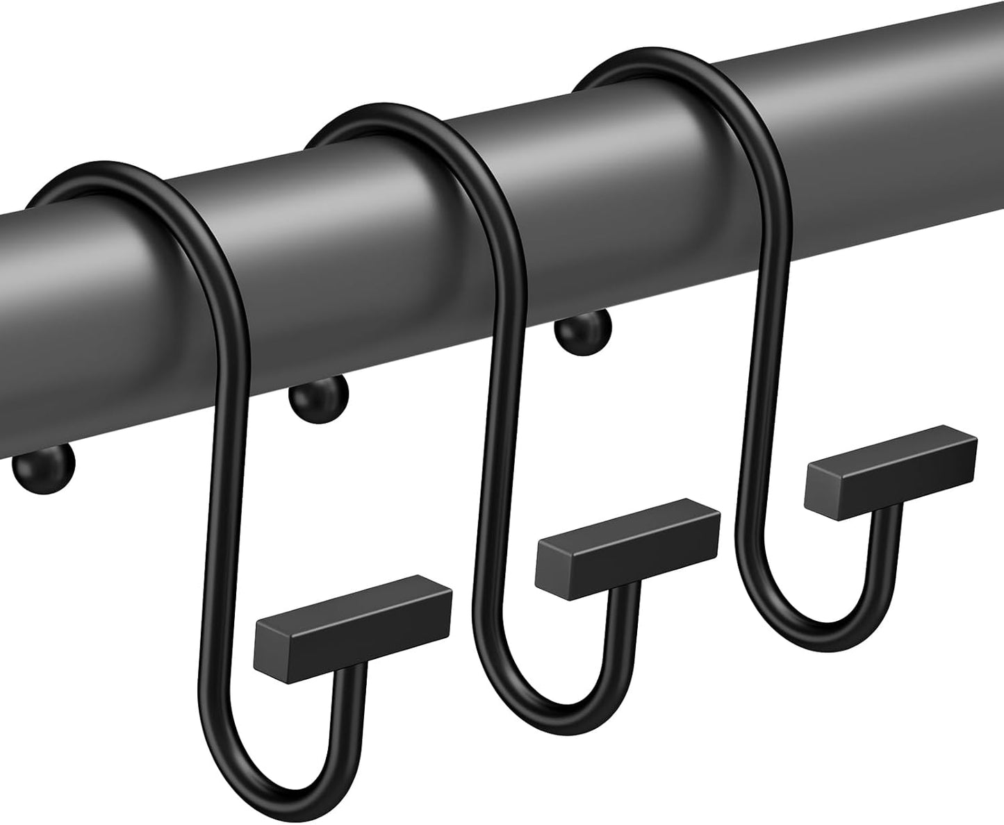 Black metal hooks on a horizontal rod against a white background