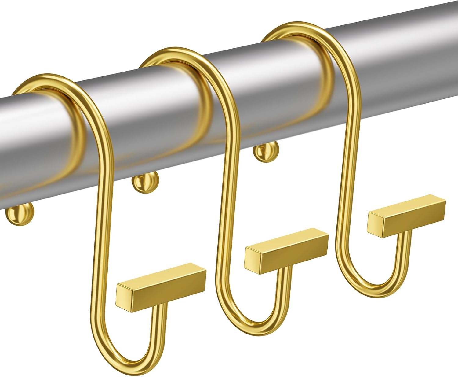 Gold curtain hooks on a silver rod against a white background