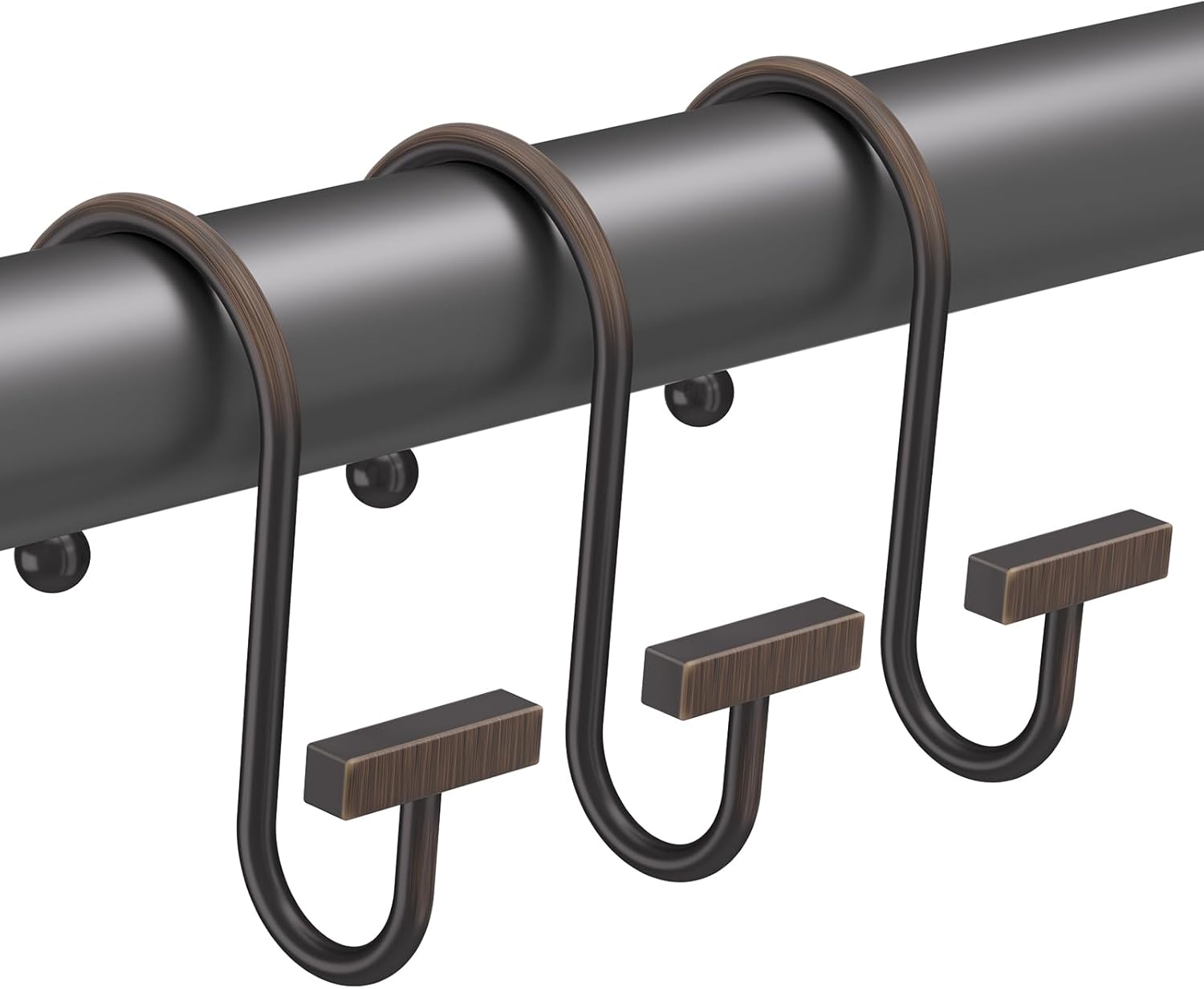 bronze metal hooks on a horizontal rod against a white background